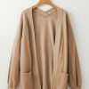 Women's Light French Beige Knit Cardigan with Exposed Seams and Pockets - Image 5