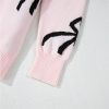 Women's Light Pink Bow Pattern Knitted Loose Fit Sweater for Casual Style - Image 13