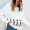 Women's Festive White Nutcracker Doll Graphic Sweatshirt with Colorful Stitch Trim - Image 3