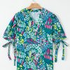Trendy Plus Size Green Abstract Print Knotted Short Sleeve Blouse - Image 6