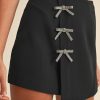 Elegant Black Rhinestone Bow Wrap High Waist Mini Skirt for Women - Image 5