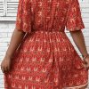 Women's Orange Plus Size Printed Surplice Neck Empire Waist Flowy Mini Dress - Image 3