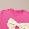 Women's Strawberry Pink Contrasting Color Ribbon Bow Front Loose Tee with Side Slits - Image 9