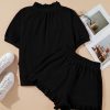 Chic Women's Black Half Zip Puff Sleeve Top and Ruffled Shorts Set - Image 10
