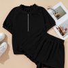 Chic Women's Black Half Zip Puff Sleeve Top and Ruffled Shorts Set - Image 9