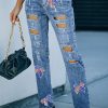 Women’s Light Blue Distressed Jeans with Sequin Bow and American Flag Pattern - Image 5