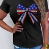 Women's Black Rhinestone Stars and Stripes Bow Graphic Tee for Independence Day - Image 5
