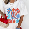Women's White Floral Cowgirl Boots Graphic Tee - Celebrate Independence Day in Style - Image 3