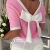 Women's Bonbon Colorblock Short Sleeve Sweater with Bow Applique and V-Shape Cut Back - Image 2