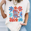 Women's White Floral Cowgirl Boots Graphic Tee - Celebrate Independence Day in Style - Image 2