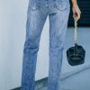 Women’s Light Blue Distressed Jeans with Sequin Bow and American Flag Pattern - Image 3