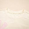 Women's Apricot Flower Patched Loose Tee with Exposed Stitching Trim - Image 7