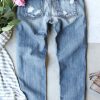 Women’s Light Blue Distressed Jeans with Sequin Bow and American Flag Pattern - Image 7